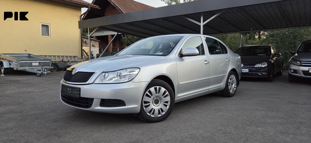 Škoda Octavia 2011 godina 1.9 tdi 77kw - slika 1
